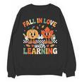 Fall In Love With Learning Shirt Autumn Thanksgiving Teacher Women Crewneck Sweatshirt, novelty gifts, funny gifts