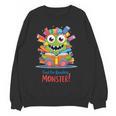 Feed The Reading Monster Halloween Teacher Women Crewneck Sweatshirt, novelty gifts, funny gifts