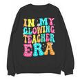 In My Glowing Teacher Era Groovy Colorful Bright Women Crewneck Sweatshirt, novelty gifts, funny gifts In My Glowing Teacher Era Groovy Colorful Bright Women Crewneck Sweatshirt, novelty gifts, funny gifts