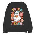 Groovy Halloween Trick Or Teach Retro Floral Ghost Teacher For Men Women Kids Women Crewneck Sweatshirt, novelty gifts, funny gifts Groovy Halloween Trick Or Teach Retro Floral Ghost Teacher For Men Women Kids Women Crewneck Sweatshirt, novelty gifts, funny gifts