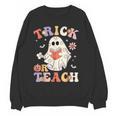 Groovy Halloween Trick Or Teach Retro Floral Ghost Teacher Women Crewneck Sweatshirt, novelty gifts, funny gifts Groovy Halloween Trick Or Teach Retro Floral Ghost Teacher Women Crewneck Sweatshirt, novelty gifts, funny gifts