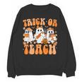 Groovy Teacher Halloween Trick Or Teach Ghost Men Women Kids Women Crewneck Sweatshirt, novelty gifts, funny gifts
