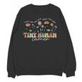 Groovy Tiny Human Tamer Floral Kindergarten Teacher Women Crewneck Sweatshirt, novelty gifts, funny gifts Groovy Tiny Human Tamer Floral Kindergarten Teacher Women Crewneck Sweatshirt, novelty gifts, funny gifts