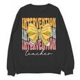 Interventionist Teacher Groovy Coquette Bow Back To School Women Crewneck Sweatshirt, novelty gifts, funny gifts