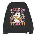 Retro Floral Ghost Trick Or Teach Groovy Teacher Halloween Women Crewneck Sweatshirt, novelty gifts, funny gifts Retro Floral Ghost Trick Or Teach Groovy Teacher Halloween Women Crewneck Sweatshirt, novelty gifts, funny gifts
