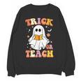 Retro Vintage Groovy Trick Or Teach Teacher Halloween For Men Women Kids Women Crewneck Sweatshirt, novelty gifts, funny gifts