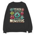 I Teach The Cutest Little Monsters Teacher Halloween Outfit Women Crewneck Sweatshirt, novelty gifts, funny gifts I Teach The Cutest Little Monsters Teacher Halloween Outfit Women Crewneck Sweatshirt, novelty gifts, funny gifts