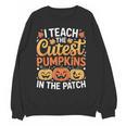 I Teach The Cutest Pumpkins Tshirt Halloween Teacher Women Crewneck Sweatshirt, novelty gifts, funny gifts