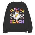 Trick Or Teach Groovy Halloween Teachers Women Crewneck Sweatshirt, novelty gifts, funny gifts