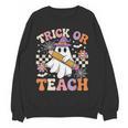 Trick Or Teach Groovy Teacher Halloween Retro Ghost Women Crewneck Sweatshirt, novelty gifts, funny gifts