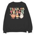 Trick Or Teach Pumpkin Candy Corn Ghost Halloween Teacher Women Crewneck Sweatshirt, novelty gifts, funny gifts Trick Or Teach Pumpkin Candy Corn Ghost Halloween Teacher Women Crewneck Sweatshirt, novelty gifts, funny gifts