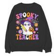Trick Or Teach Spooky Teacher Ghost Halloween Teacher Women Crewneck Sweatshirt, novelty gifts, funny gifts Trick Or Teach Spooky Teacher Ghost Halloween Teacher Women Crewneck Sweatshirt, novelty gifts, funny gifts