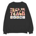 Trick Or Teach With Symbols Special Education Teacher Spooky Women Crewneck Sweatshirt, novelty gifts, funny gifts