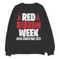 We Wear Red For Red Ribbon Week Awareness Mothers Teachers Women Crewneck Sweatshirt, novelty gifts, funny gifts We Wear Red For Red Ribbon Week Awareness Mothers Teachers Women Crewneck Sweatshirt, novelty gifts, funny gifts