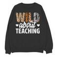 Wild About Teaching Teacher Teaching Back To School Women Crewneck Sweatshirt, novelty gifts, funny gifts