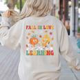 Groovy Fall In Love With Learning Autumn Pumpkin Teacher Women's Sweatshirt Back Print Sand