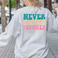 Never Underestimate A Public School Teacher Groovy Women Women's Sweatshirt Back Print Ash