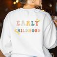 Early Childhood Dream Team Daycare Teacher Toddler Teacher Women's Sweatshirt Back Print White