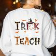 Fall Holiday Themed Thanksgiving Halloween Teacher Trick Or Women's Sweatshirt Back Print White