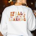 Fall In Love With Learning Autum Thanksgiving Teacher Kids Women's Sweatshirt Back Print White