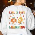 Groovy Fall In Love With Learning Autumn Pumpkin Teacher Women's Sweatshirt Back Print White
