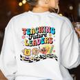 Retro Teaching Future Leaders Groovy Teacher Back To School Women's Sweatshirt Back Print White