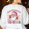 Santa's Favorite Teacher Groovy Christmas Teacher Boys Girls Women's Sweatshirt Back Print White Santa's Favorite Teacher Groovy Christmas Teacher Boys Girls Women's Sweatshirt Back Print White