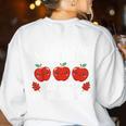 I Teach The Cutest Apples In The Orchard Cute Fall Teacher Women's Sweatshirt Back Print White