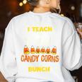 I Teach The Cutest Candy Corn In The Patch Teacher Halloween Women's Sweatshirt Back Print White