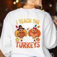 I Teach The Cutest Little Turkeys Teacher Thanksgiving Women's Sweatshirt Back Print White