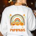 I Teach The Cutest Pumpkins In The Patch Teacher Halloween Women's Sweatshirt Back Print White