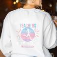 Never Underestimate Teachers Who Runs For Fun Running Teache Women's Sweatshirt Back Print White