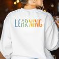 Vintage Play Is Learning Back To School Toddler Teacher Women's Sweatshirt Back Print White