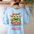 Feed The Reading Monster Halloween Teacher Women's Sweatshirt Back Print Light Blue