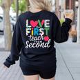 Love Them First Teach Them Second Teacher Student Love Quote Women's Sweatshirt Back Print Black