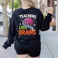 Teachers Love Brains Halloween 2025 Skeleton Costume Women's Sweatshirt Back Print Black Teachers Love Brains Halloween 2025 Skeleton Costume Women's Sweatshirt Back Print Black