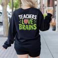 Teachers Love Brains Halloween Teacher Zombie Women's Sweatshirt Back Print Black Teachers Love Brains Halloween Teacher Zombie Women's Sweatshirt Back Print Black