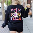 Trick Or Teach Halloween Teacher Floral Ghost Groovy Women's Sweatshirt Back Print Black Trick Or Teach Halloween Teacher Floral Ghost Groovy Women's Sweatshirt Back Print Black