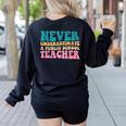 Never Underestimate A Public School Teacher Groovy Women Women's Sweatshirt Back Print Black