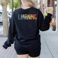 Vintage Play Is Learning Back To School Toddler Teacher Women's Sweatshirt Back Print Black