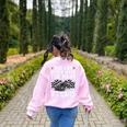 Haunted By 6-7 Teacher 67 Halloween Skeleton Six Seven Women's Sweatshirt Back Print Light Pink