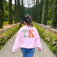 TK Teacher Retro Groovy Vintage Happy First Day Of School Women's Sweatshirt Back Print Light Pink