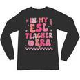 In My Esl Teacher Era Back To School ESL Teacher Groovy Unisex Long Sleeve T-Shirt, trending gift In My Esl Teacher Era Back To School ESL Teacher Groovy Unisex Long Sleeve T-Shirt, trending gift