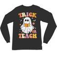 Retro Vintage Groovy Trick Or Teach Teacher Halloween For Men Women Kids Unisex Long Sleeve T-Shirt, trending gift Retro Vintage Groovy Trick Or Teach Teacher Halloween For Men Women Kids Unisex Long Sleeve T-Shirt, trending gift