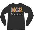 Toddler Teacher Retro Groovy Women Happy First Day Of School Unisex Long Sleeve T-Shirt, trending gift Toddler Teacher Retro Groovy Women Happy First Day Of School Unisex Long Sleeve T-Shirt, trending gift