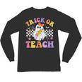 Trick Or Teach Groovy Halloween Teachers Unisex Long Sleeve T-Shirt, trending gift
