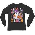 Trick Or Teach Groovy Teacher Ghost Halloween Teacher Unisex Long Sleeve T-Shirt, trending gift