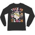 Trick Or Teach Groovy Teacher Halloween Retro Teacher Ghost Unisex Long Sleeve T-Shirt, trending gift Trick Or Teach Groovy Teacher Halloween Retro Teacher Ghost Unisex Long Sleeve T-Shirt, trending gift