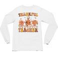 Thankful Teacher Retro Groovy Thanksgiving Fall Women Men Unisex Long Sleeve T-Shirt, trending gift Thankful Teacher Retro Groovy Thanksgiving Fall Women Men Unisex Long Sleeve T-Shirt, trending gift