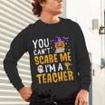 You Cant Scare Me Im A Teacher Halloween Trick Or Teach 2024 Unisex Long Sleeve T-Shirt, gift for family, gift for coworker You Cant Scare Me Im A Teacher Halloween Trick Or Teach 2024 Unisex Long Sleeve T-Shirt, gift for family, gift for coworker